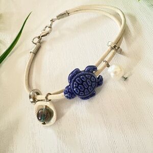 Hand Crafted Cream Leather Bracelet with Blue Turtle Charm